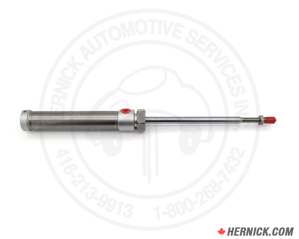 Long pneumatic air lock cylinder with a cylindrical metal body, extended steel piston rod and air connection port with red plastic coverings.