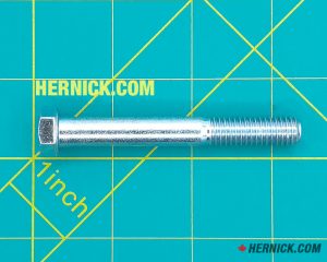 Steel A2159 3/8"-16 NC x 3-inch hex head cap screw used as replacement mounting hardware on a green background with yellow grid marks.