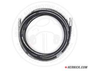 Coiled black hose with metal fittings on both ends.