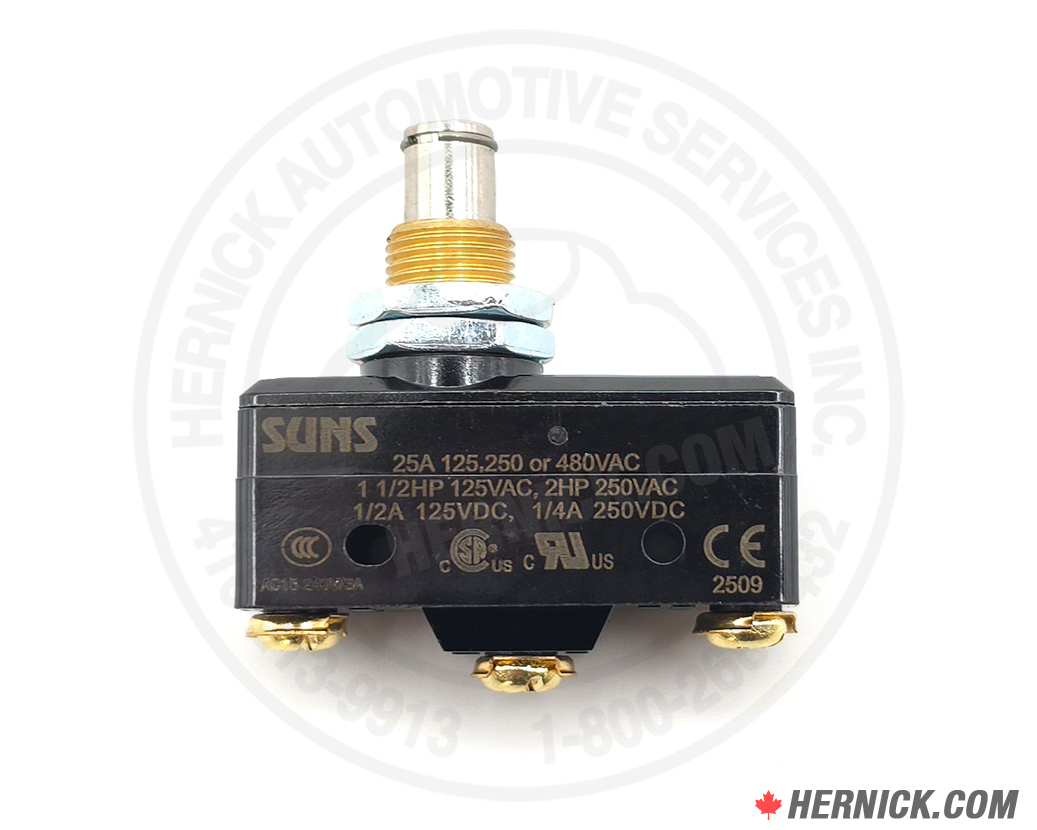 small rectangular black box with 3 gold coloured metal circles on the bottom end