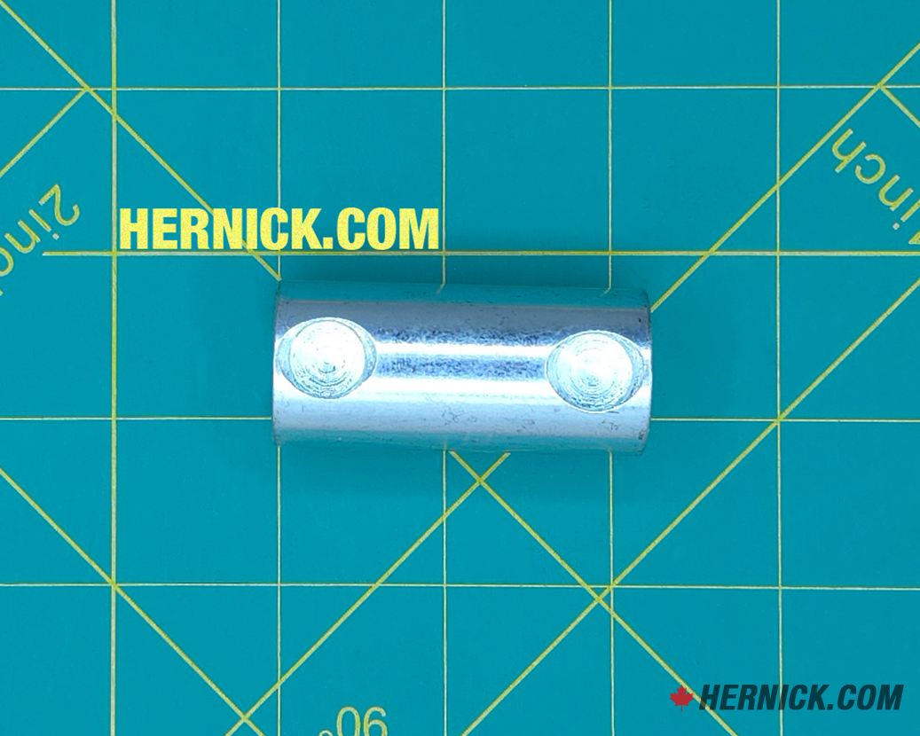 Steel mechanical lock pin on a green background with yellow grid marks.