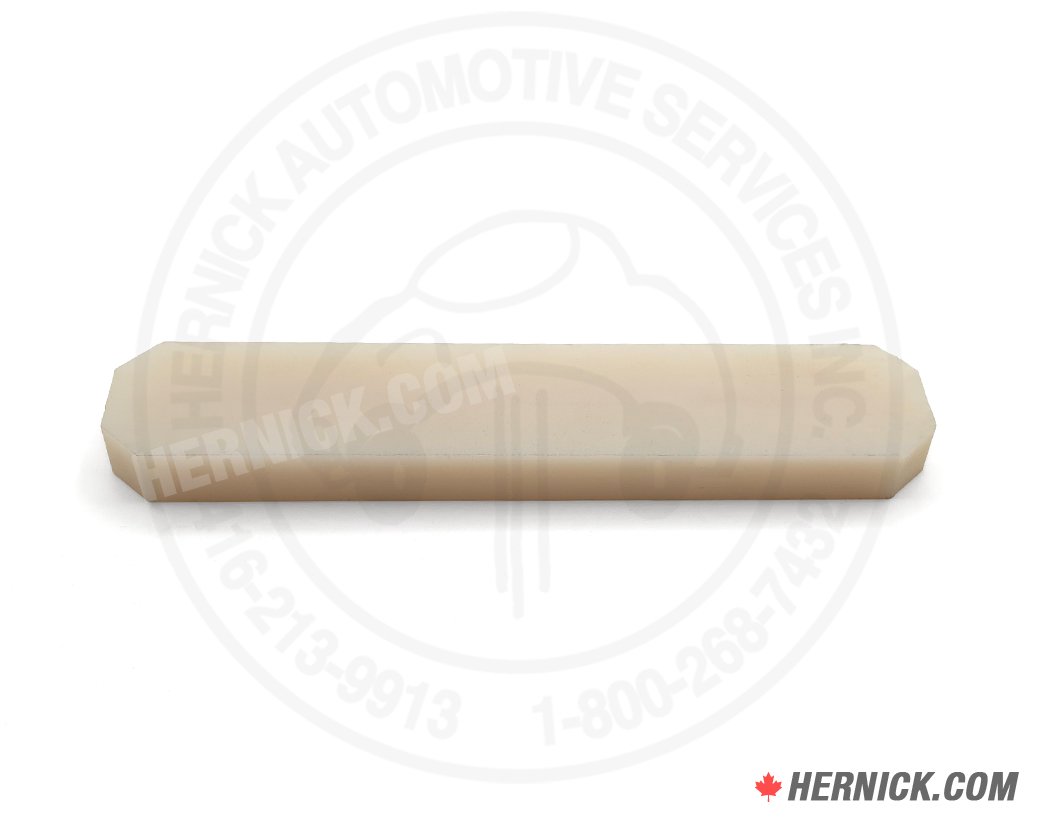 White top pin slider wear strip.