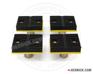 Four SVI BH-7101-01C generic aftermarket lift adapter assemblies with metal adapter bases, lifting pads, and 1-1/2-inch diameter drop-in mounting pins.
