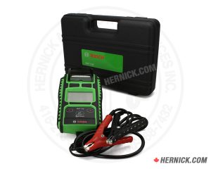 Bosch BAT 135 handheld automotive battery tester with digital display, attached battery test leads and clamps, and integrated printer for producing battery and electrical system test results.